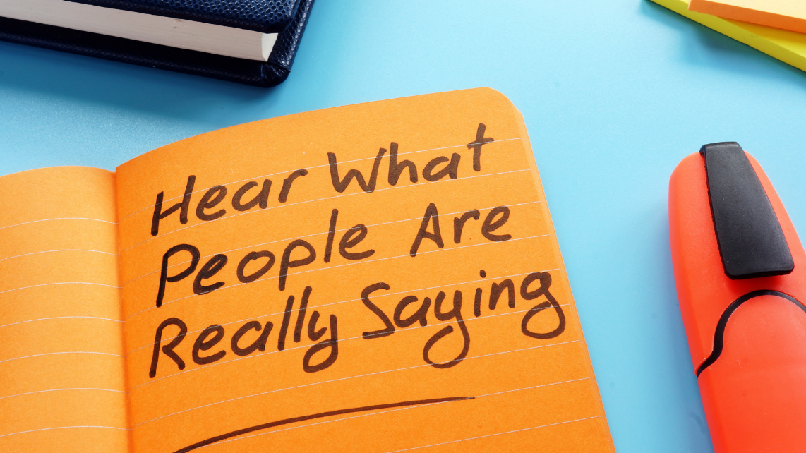 A notebook written with the sentence 