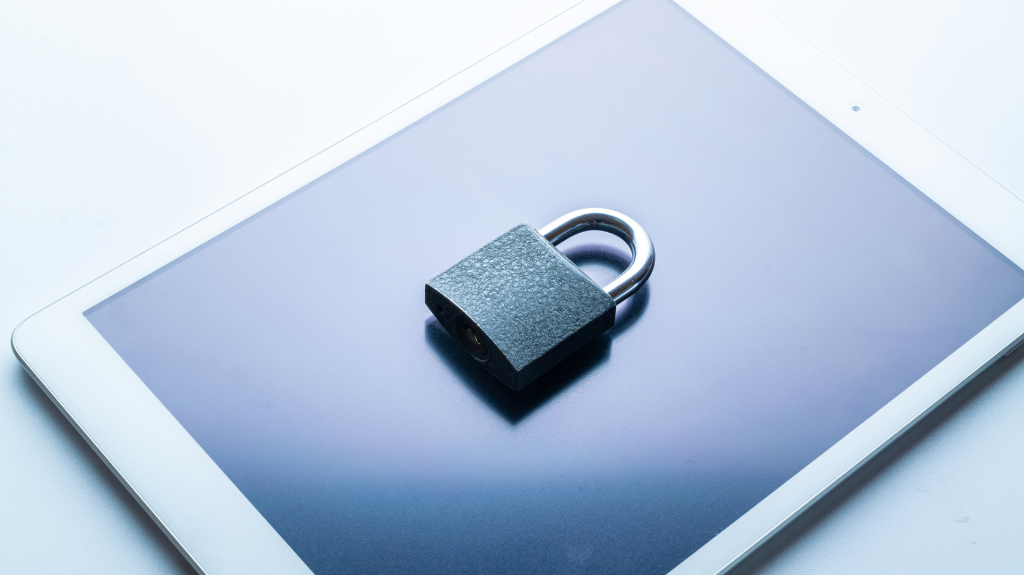 A mobile phone with padlock above it, describing device security
