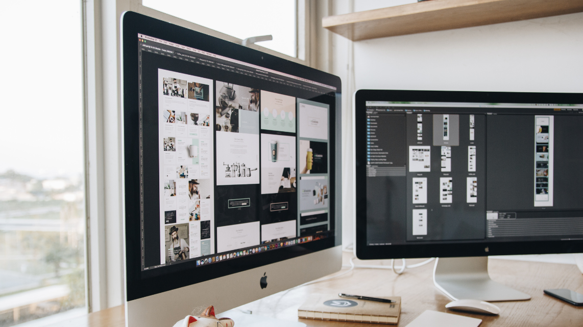 Two desktop monitors with opened project management tools tabs