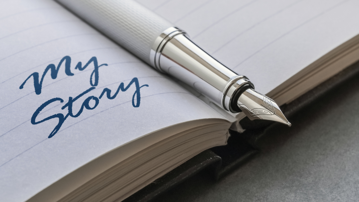 A fountain pen and an open notebook with 