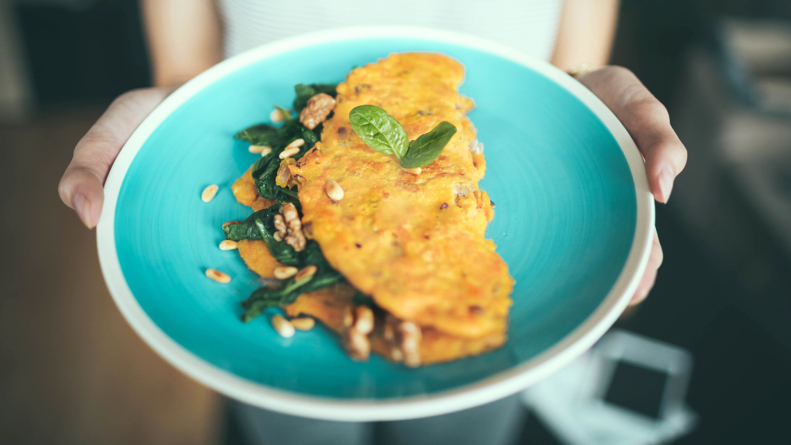 An omelette in a blue plate