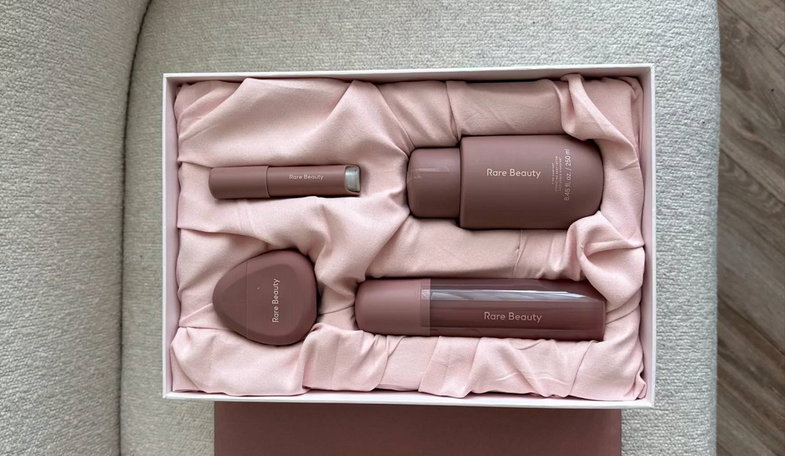 Rare Beauty product packaging with pink cloth for aesthetic purposes